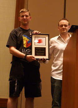 Tim Courtney presents Orion Pobursky with his 2006 James Jessiman Memorial Award
